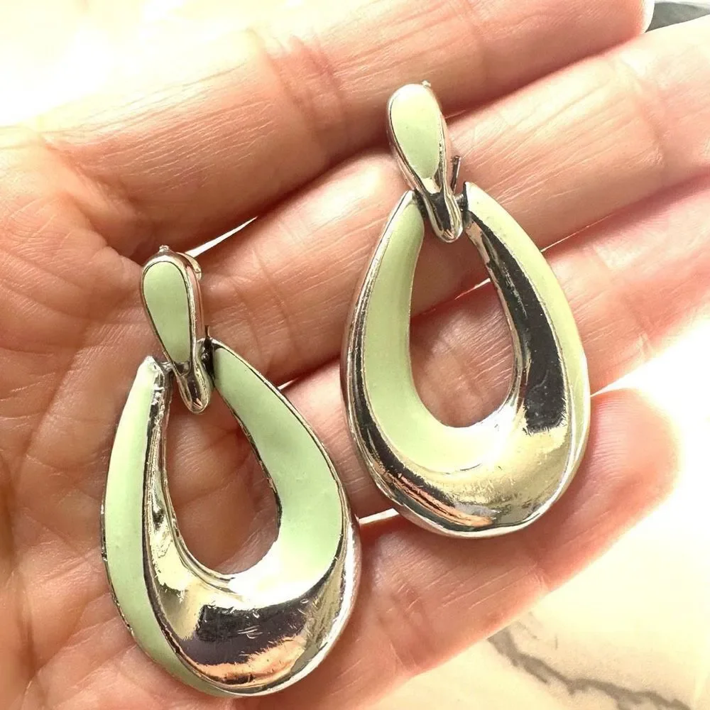 Silver tone and green teardrop post earrings